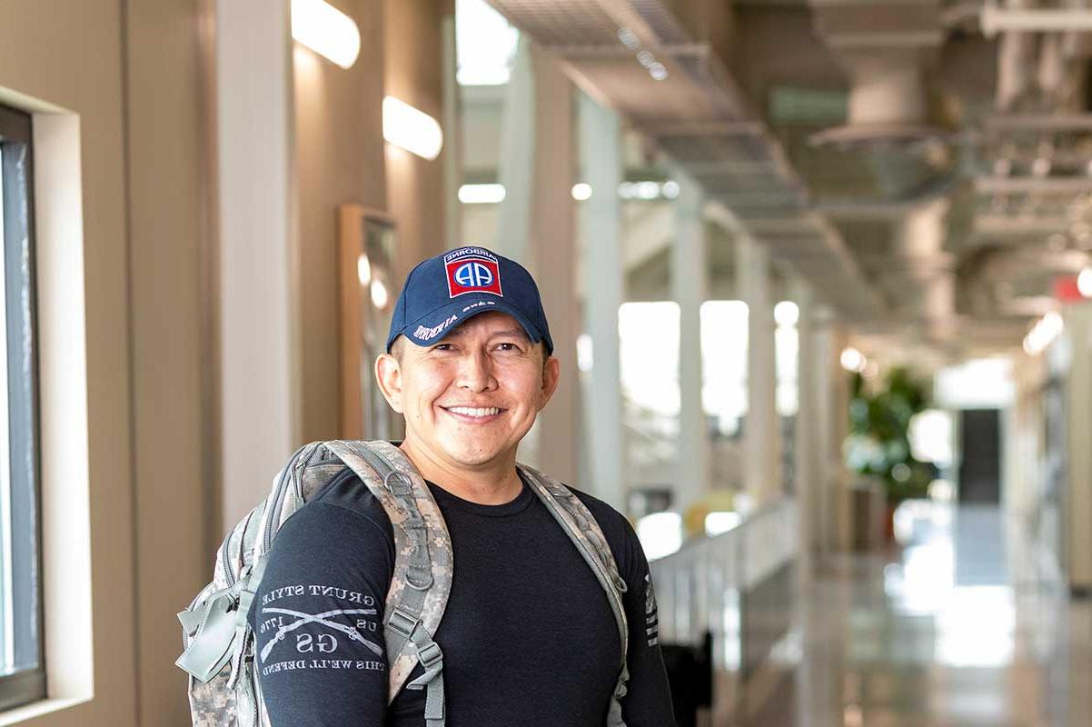 Veteran standing with his backpack at SJC.